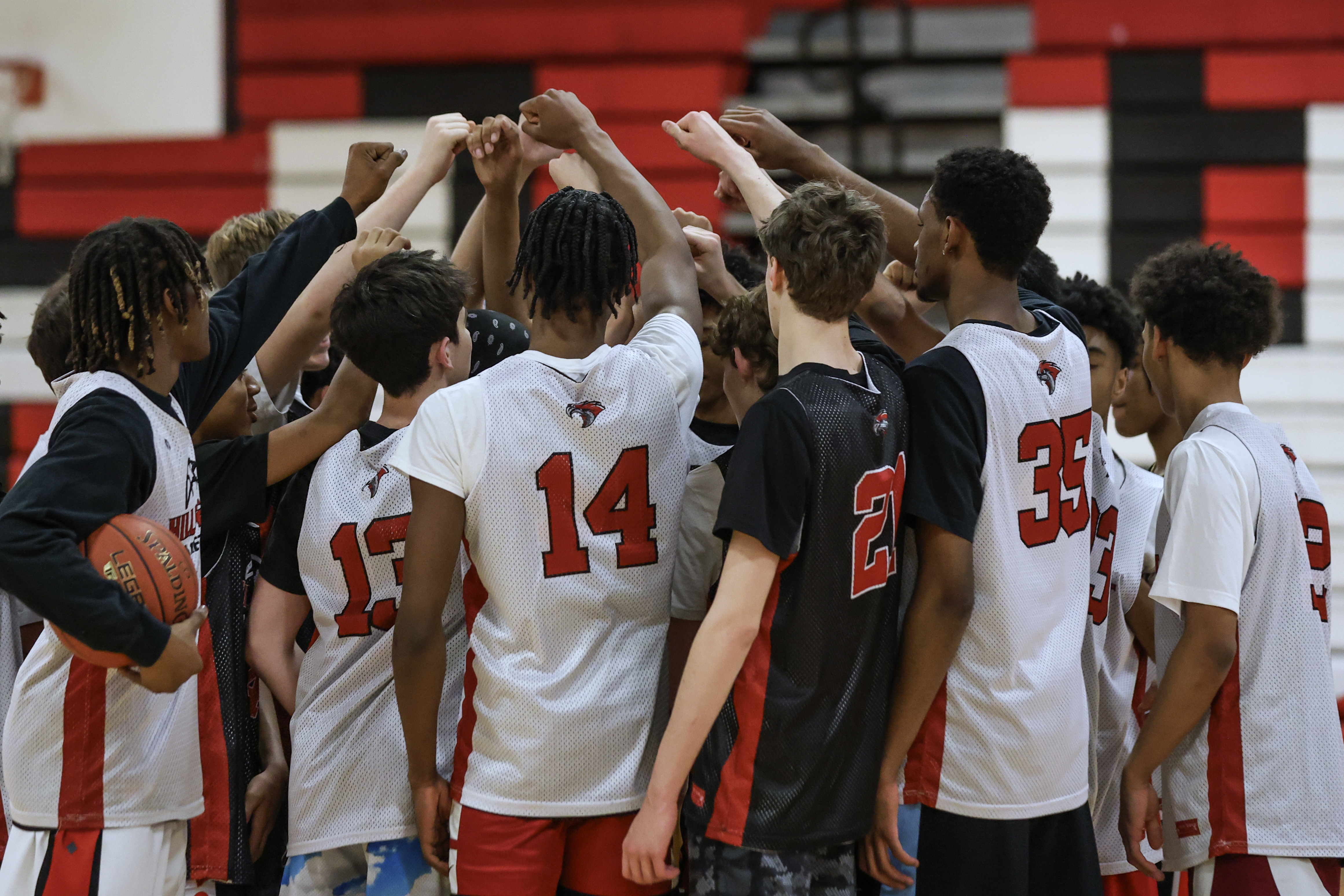 Half Hollow Hills East boys basketball team huddle up during practice at Half Hollow Hills High School East in Dix Hills, N.Y. on Tuesday, March 11, 2025.
